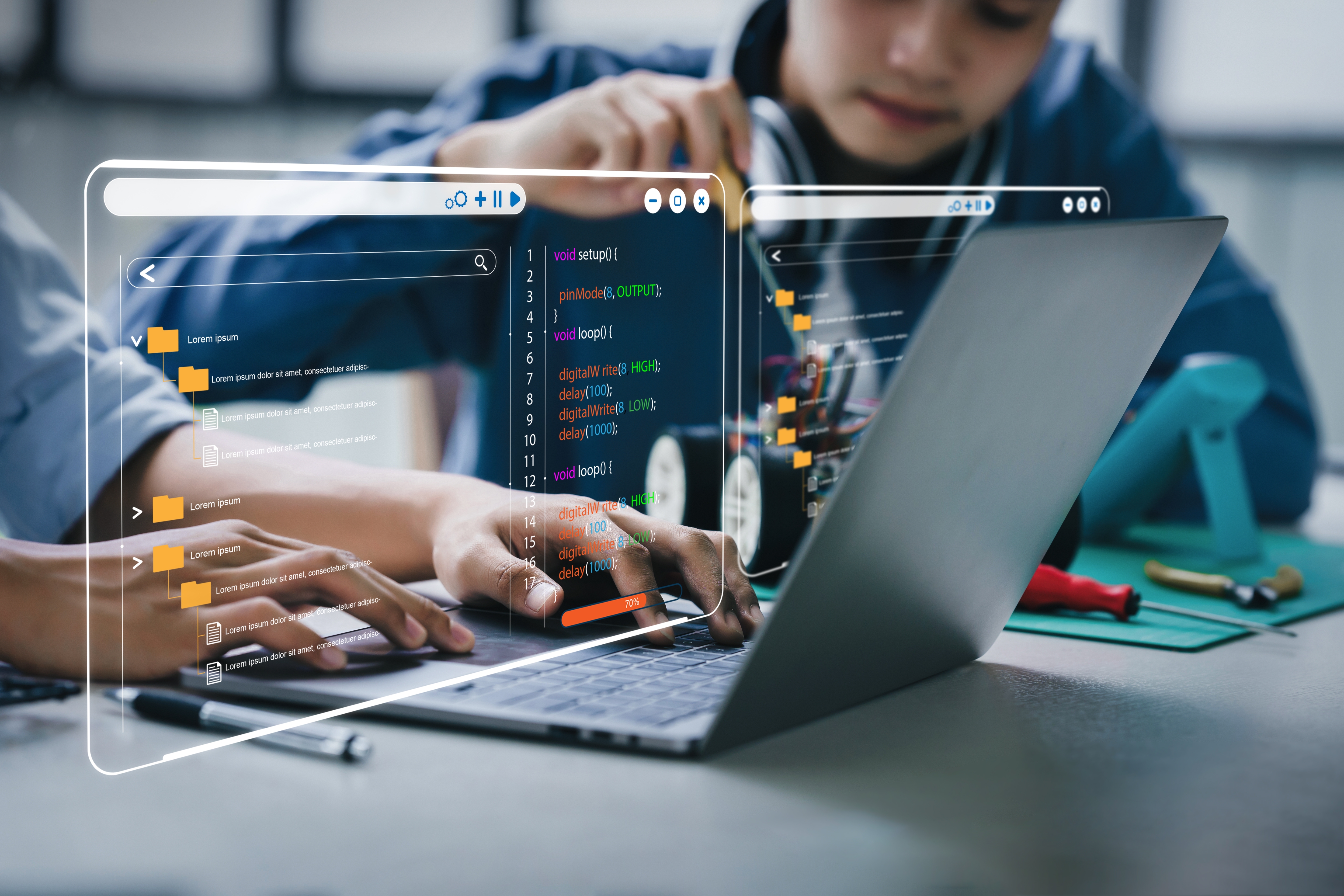 Student sitting in from of a laptop.